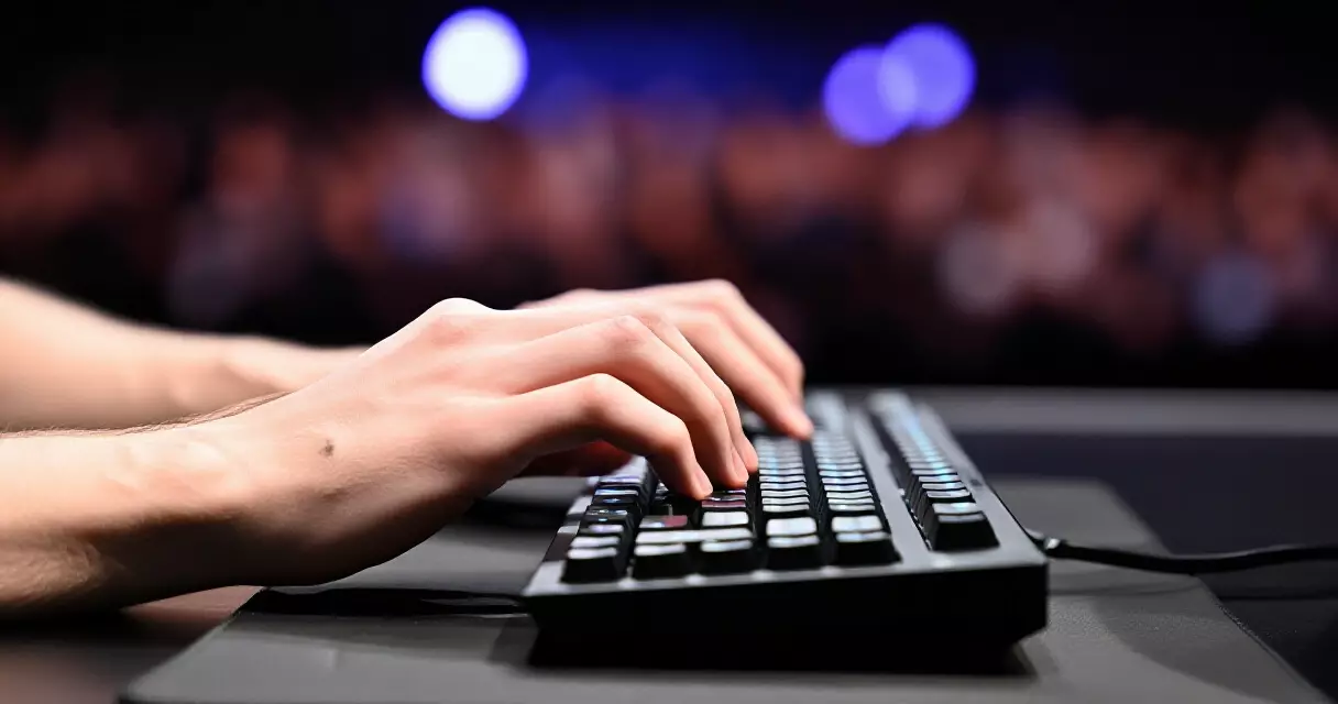 Esports player hands on keyboard during live tournament match