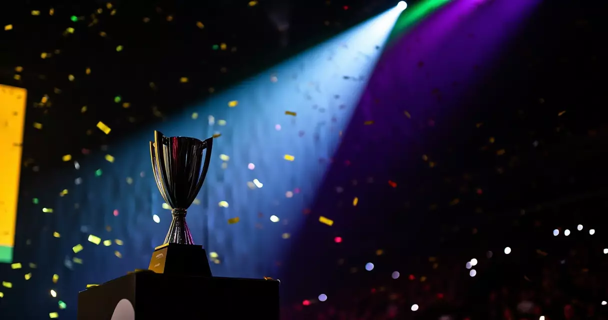 Esports championship trophy on stage with confetti and dramatic lighting